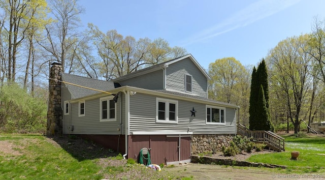 79 Jacob Rd, Southbury, CT 06488 - view of property exterior with a yard and a chimney