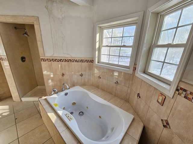 bathroom with tile patterned floors and plus walk in shower