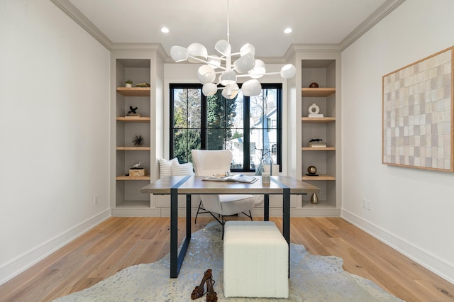 office area with built in shelves, light hardwood / wood-style flooring, and ornamental molding