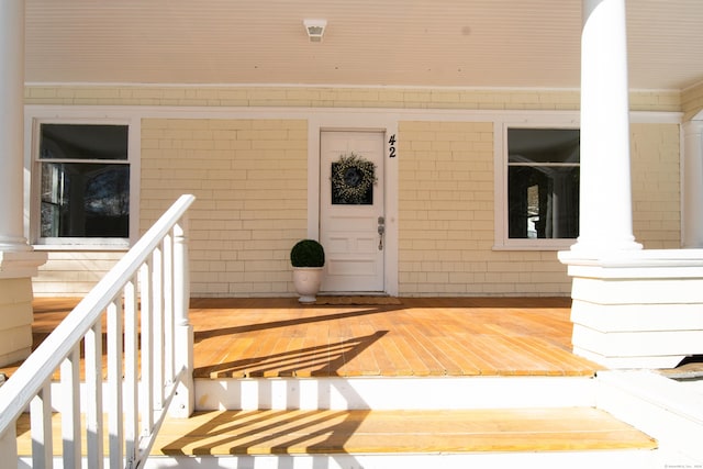 entrance to property with covered porch