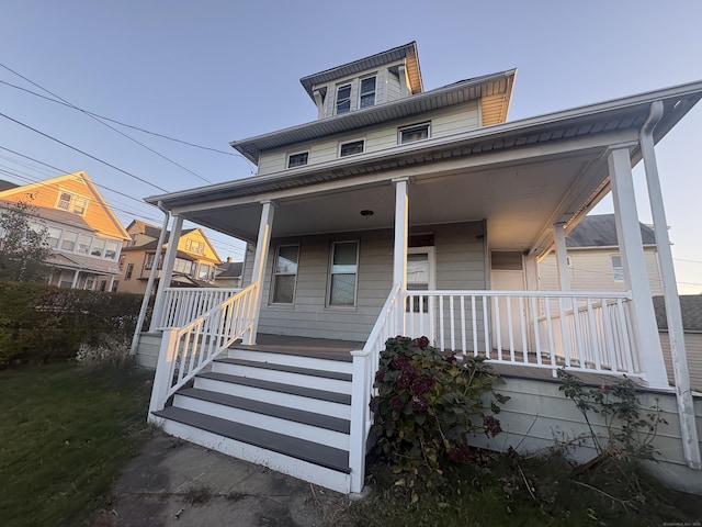 view of front of home featuring covered porch