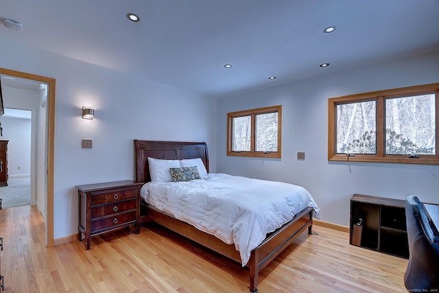 bedroom with light hardwood / wood-style floors