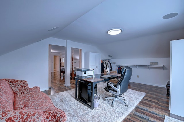 office featuring dark hardwood / wood-style flooring and vaulted ceiling