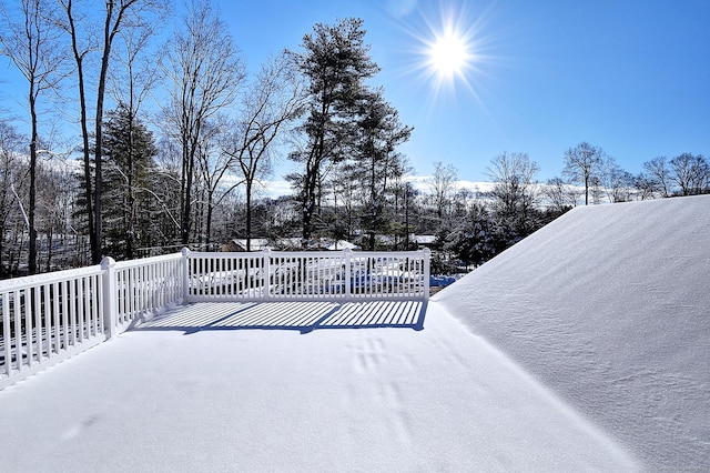 view of snow covered deck