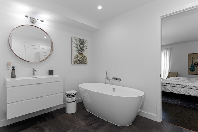 bathroom featuring vanity and a bathtub