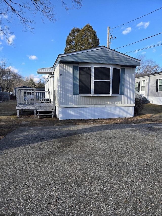 view of front of property with a deck