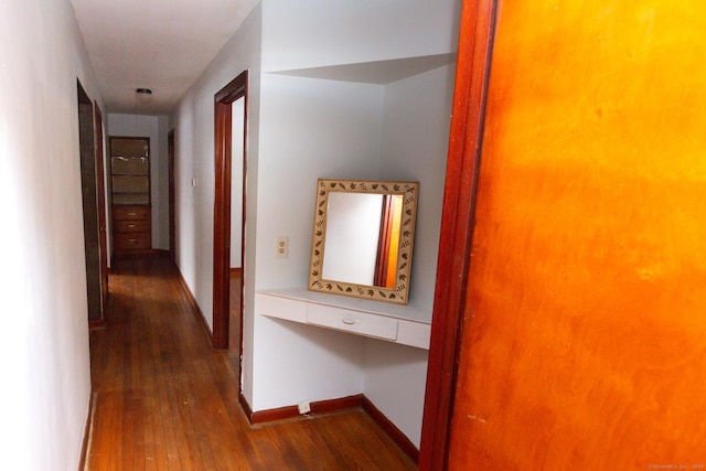 hallway featuring dark wood-type flooring