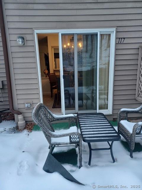 view of snow covered patio