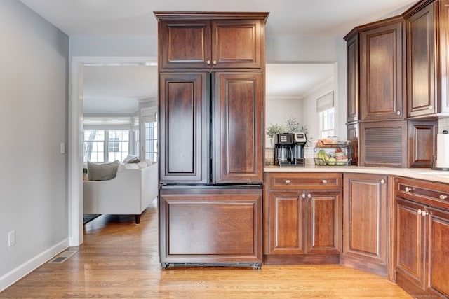 kitchen with light hardwood / wood-style floors