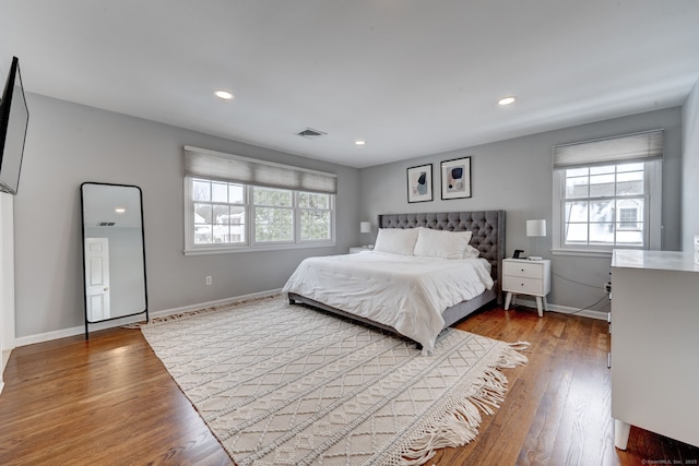 bedroom featuring wood-type flooring