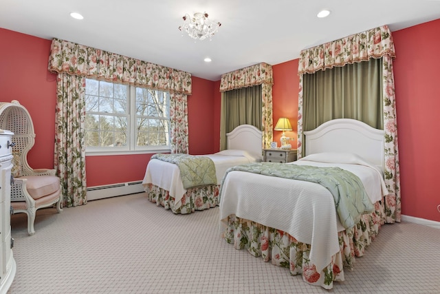 carpeted bedroom with a baseboard radiator, baseboards, and recessed lighting