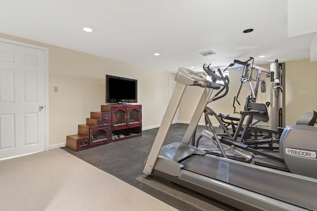 workout area featuring visible vents, baseboards, and recessed lighting