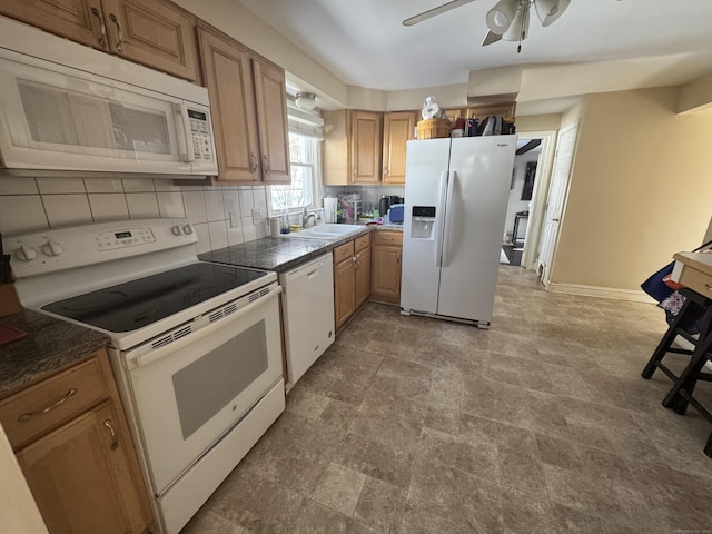 kitchen with tasteful backsplash, white appliances, ceiling fan, and sink