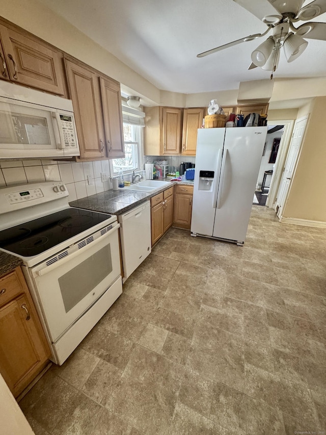 kitchen with ceiling fan, white appliances, sink, and decorative backsplash