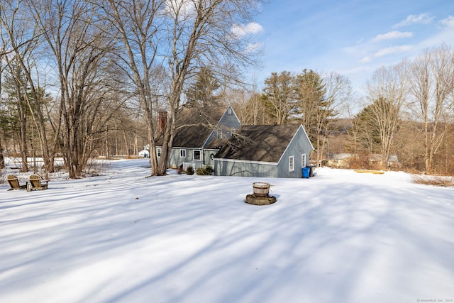 view of yard covered in snow