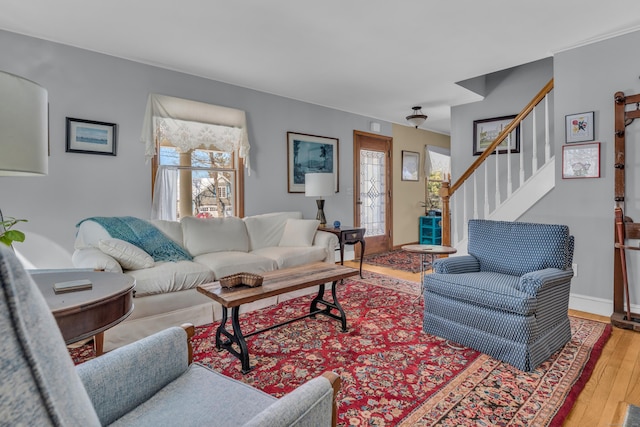 living room with hardwood / wood-style floors and a wealth of natural light