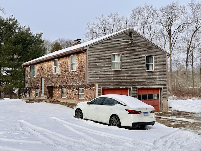 exterior space with a garage