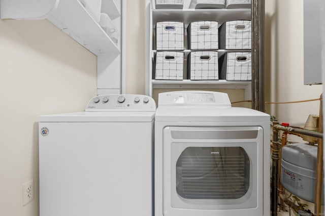 laundry room with laundry area and separate washer and dryer