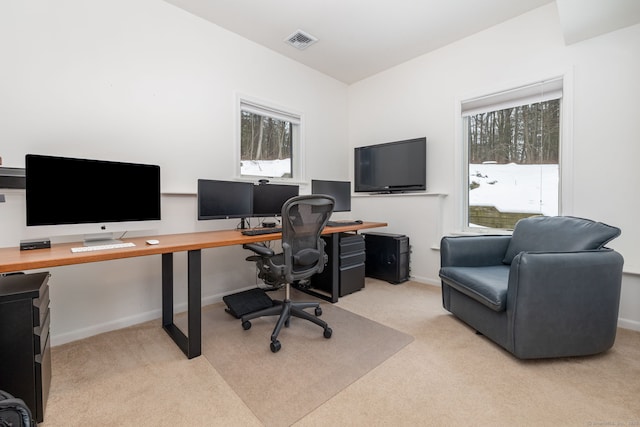 office space featuring carpet, visible vents, and baseboards