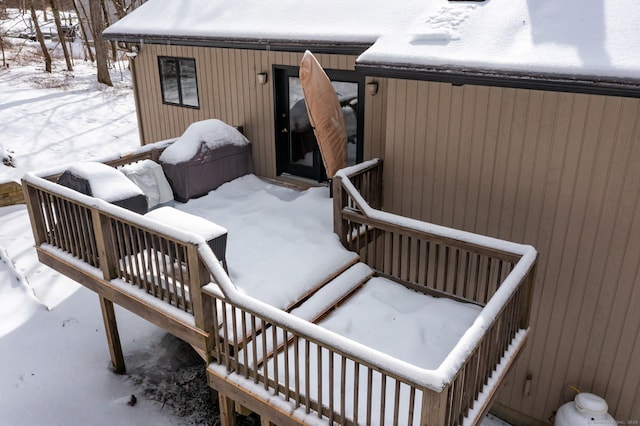 view of snow covered deck