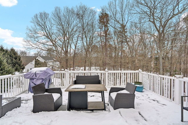 view of snow covered deck