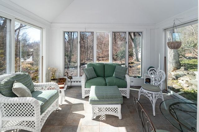 sunroom with vaulted ceiling and baseboard heating