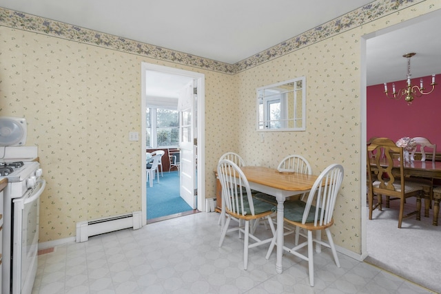 dining area with wallpapered walls, baseboards, and a baseboard radiator