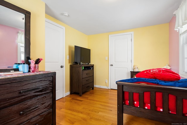 bedroom featuring light hardwood / wood-style flooring