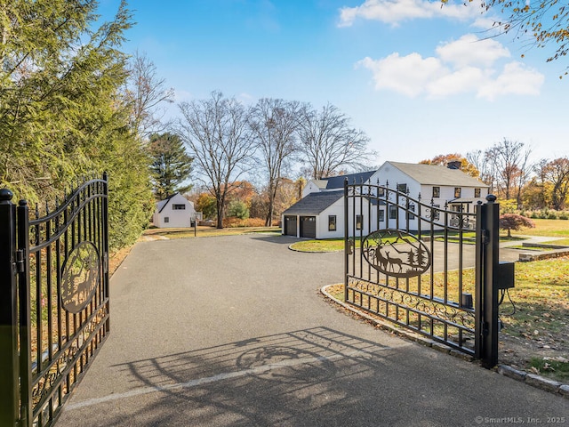 view of gate featuring a garage