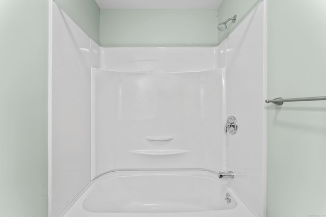 bathroom featuring washtub / shower combination