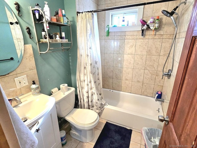 full bathroom featuring vanity, shower / tub combo, tile patterned floors, and toilet