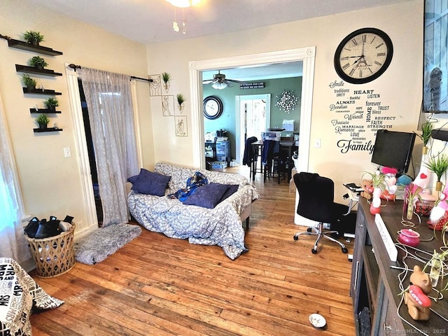 bedroom with hardwood / wood-style flooring