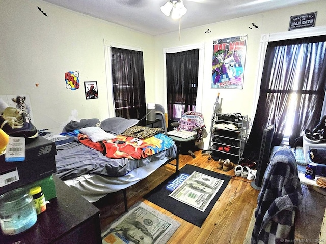 bedroom featuring wood-type flooring