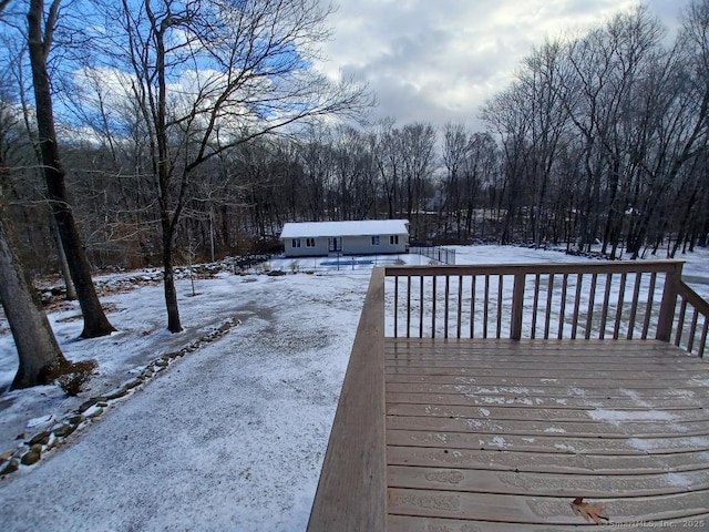 view of snow covered deck