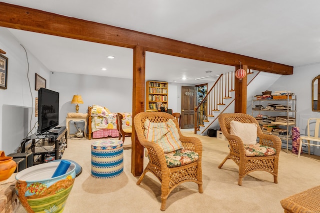 carpeted living area with stairway, beamed ceiling, and recessed lighting