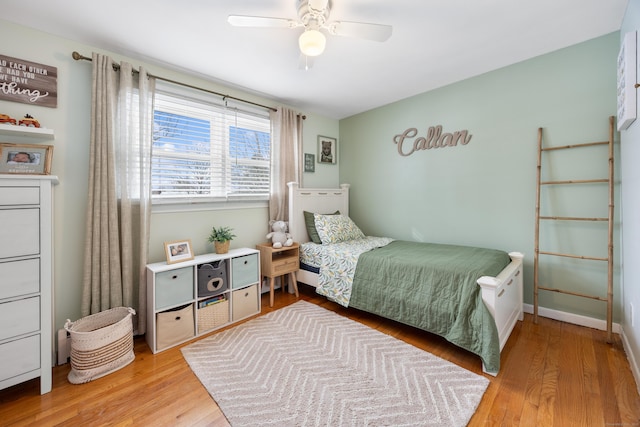 bedroom featuring ceiling fan and light hardwood / wood-style floors