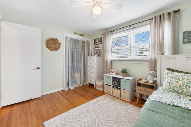 bedroom featuring ceiling fan and light wood-type flooring