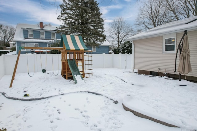 view of snow covered playground