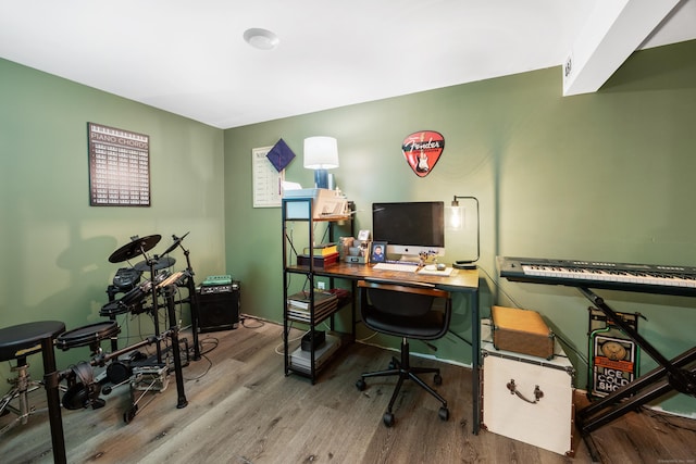 office space with wood-type flooring