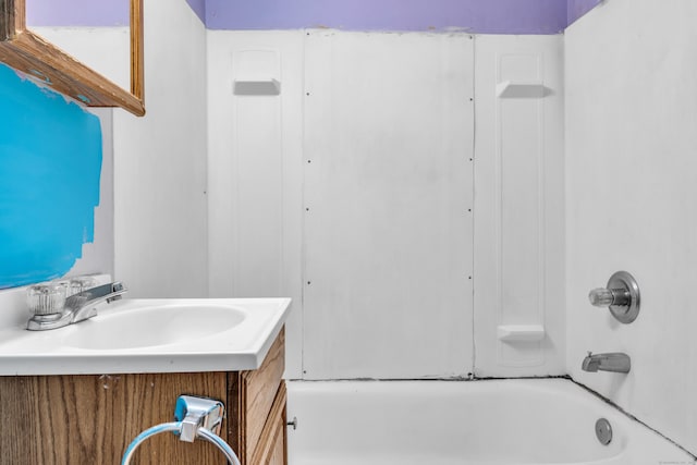 bathroom featuring vanity and shower / bath combination