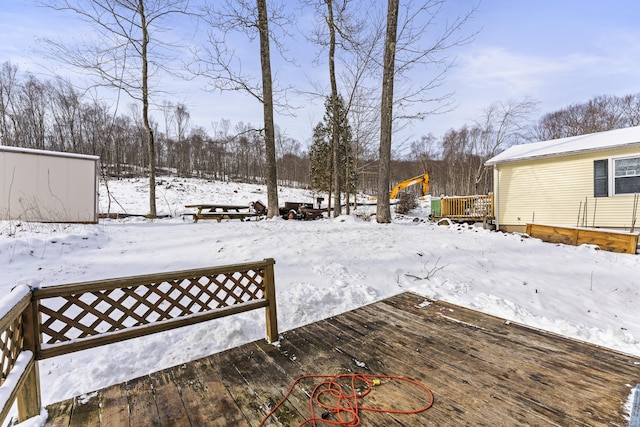 view of snow covered deck