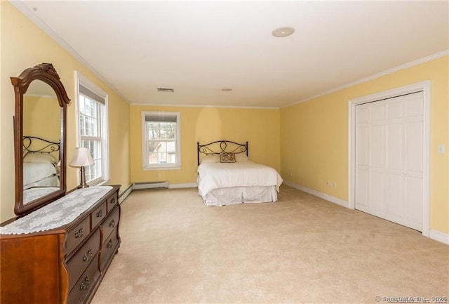 carpeted bedroom with a baseboard heating unit and crown molding