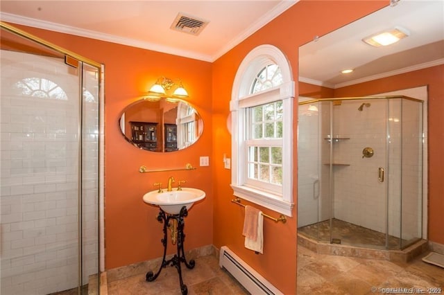 bathroom with an enclosed shower, sink, ornamental molding, and baseboard heating