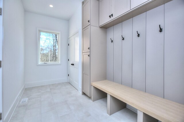 mudroom featuring baseboards and recessed lighting