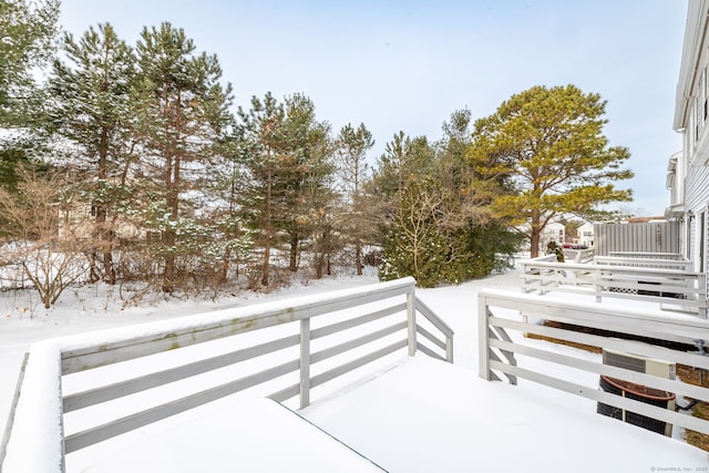 view of yard layered in snow