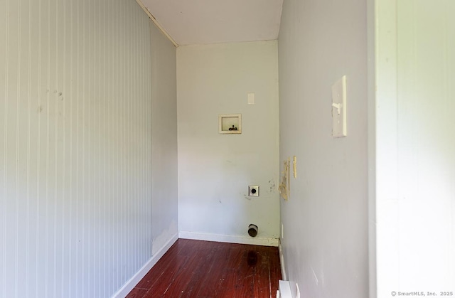 laundry room featuring electric dryer hookup, dark hardwood / wood-style floors, and washer hookup