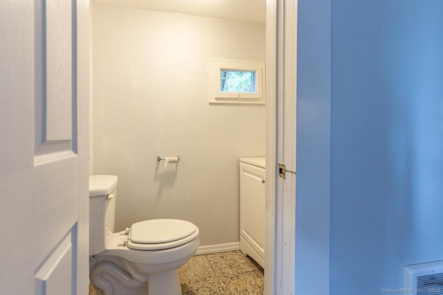 bathroom featuring toilet