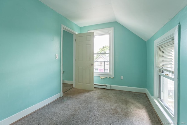 bonus room with lofted ceiling, carpet, and a baseboard heating unit