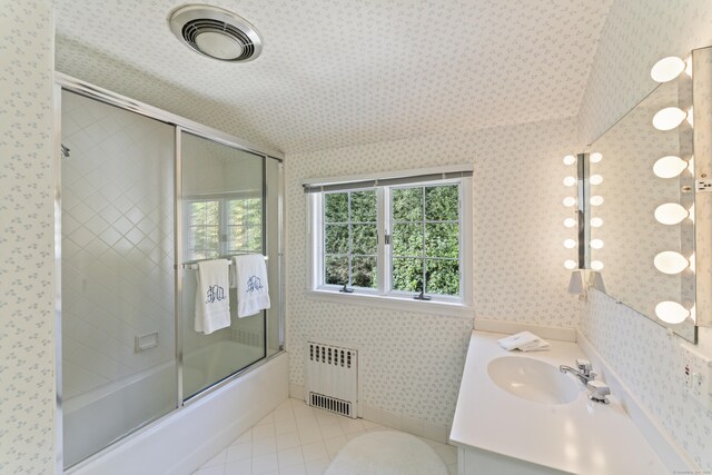 full bath featuring shower / bath combination with glass door, radiator, visible vents, tile patterned flooring, and wallpapered walls