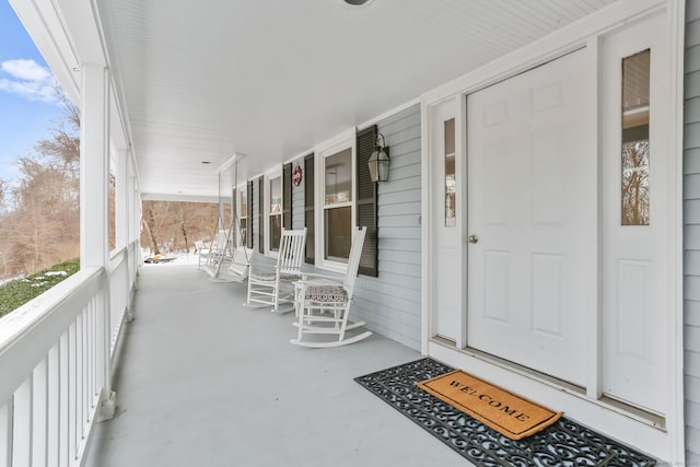 doorway to property with a porch